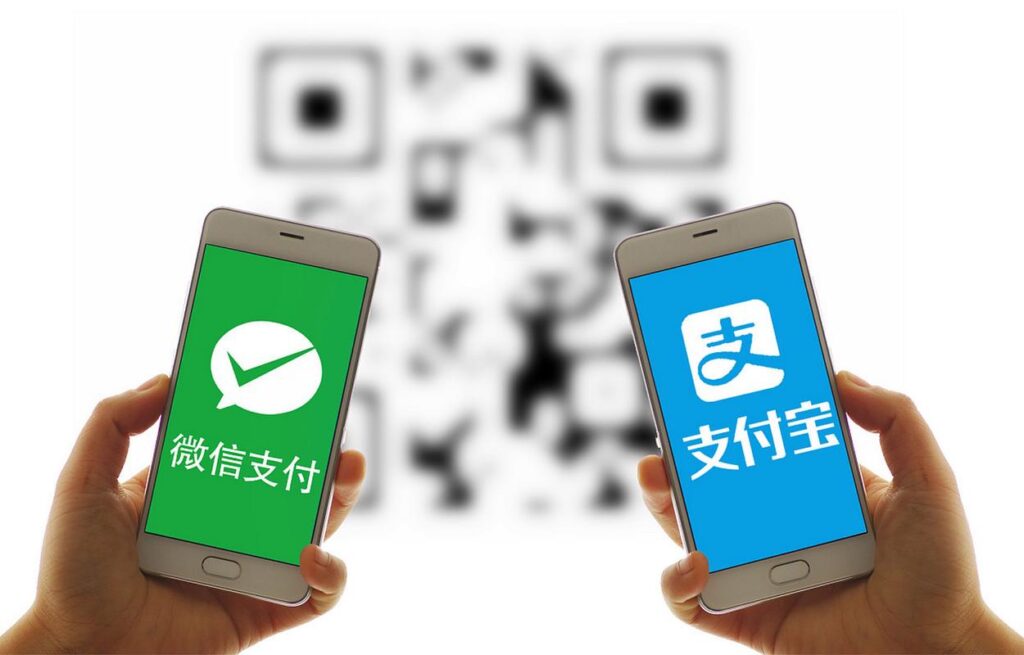Alipay and WeChat Pay mobile payment apps comparison showing two smartphones with QR codes for foreign travelers in China