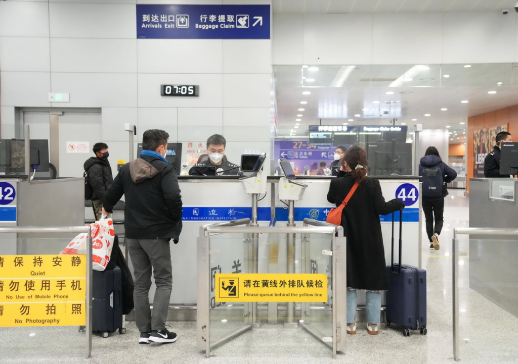 China visa-free entry passport stamp at border control checkpoint