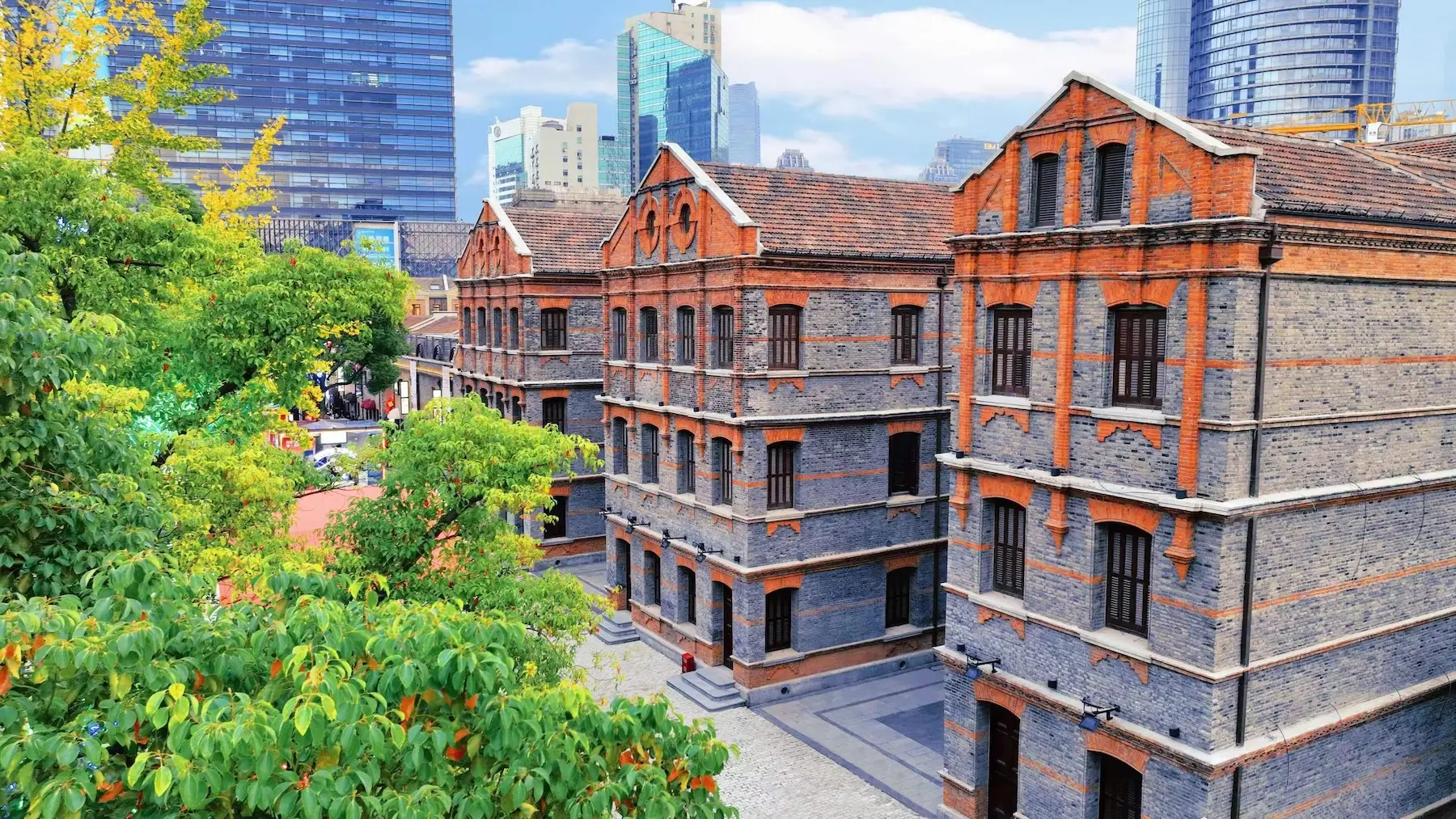 Historic Shikumen stone gate architecture with red brick details in Shanghai