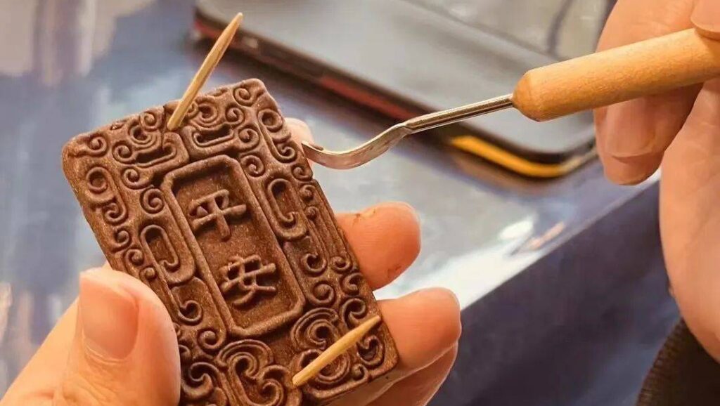 Hand carving Chinese Ping An wooden pendant with traditional engraving tools