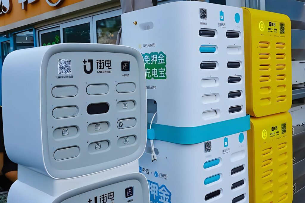 Shared power bank rental stations stacked outside a store in China
