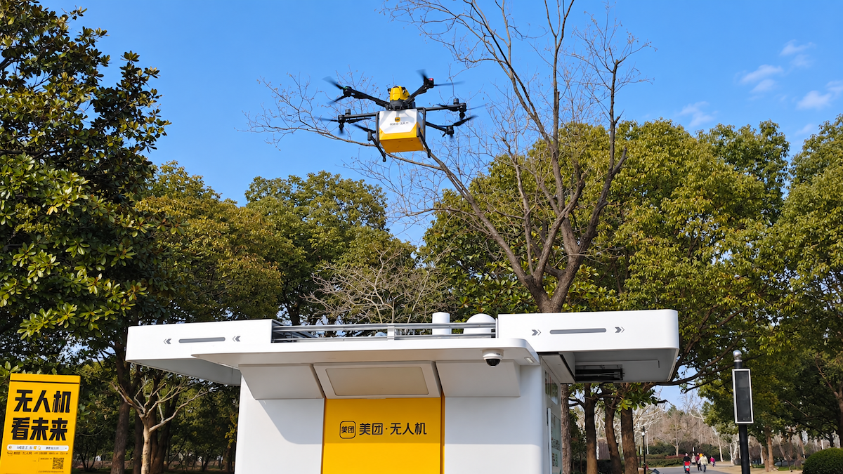 Meituan delivery drone flying over park at Zhangjiang AI Water Ring, Shanghai