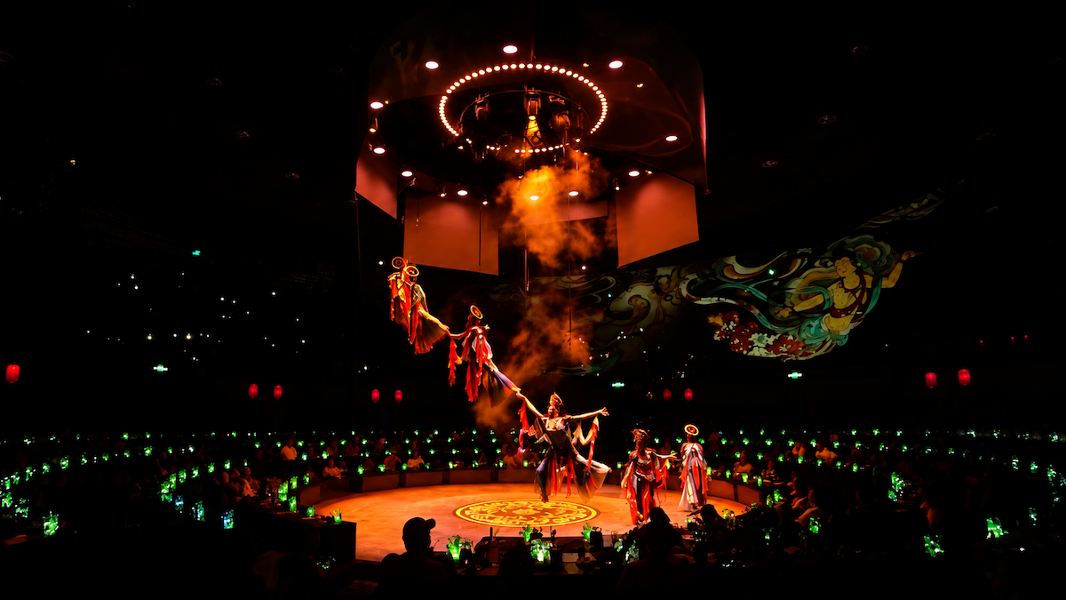 Shanghai history performance scene with actors recreating 1920s Bund era on the 360-degree rotating dinner theater stage
